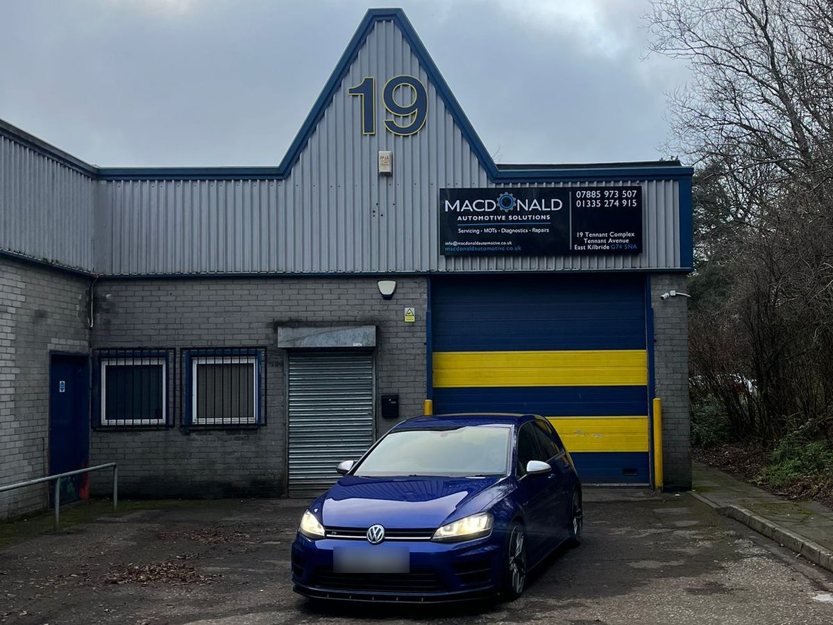 Blue Golf R parked outside the Macdonald Automotive workshop